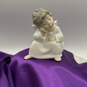 Sitting Lladro Angel, about 4” tall, #4539